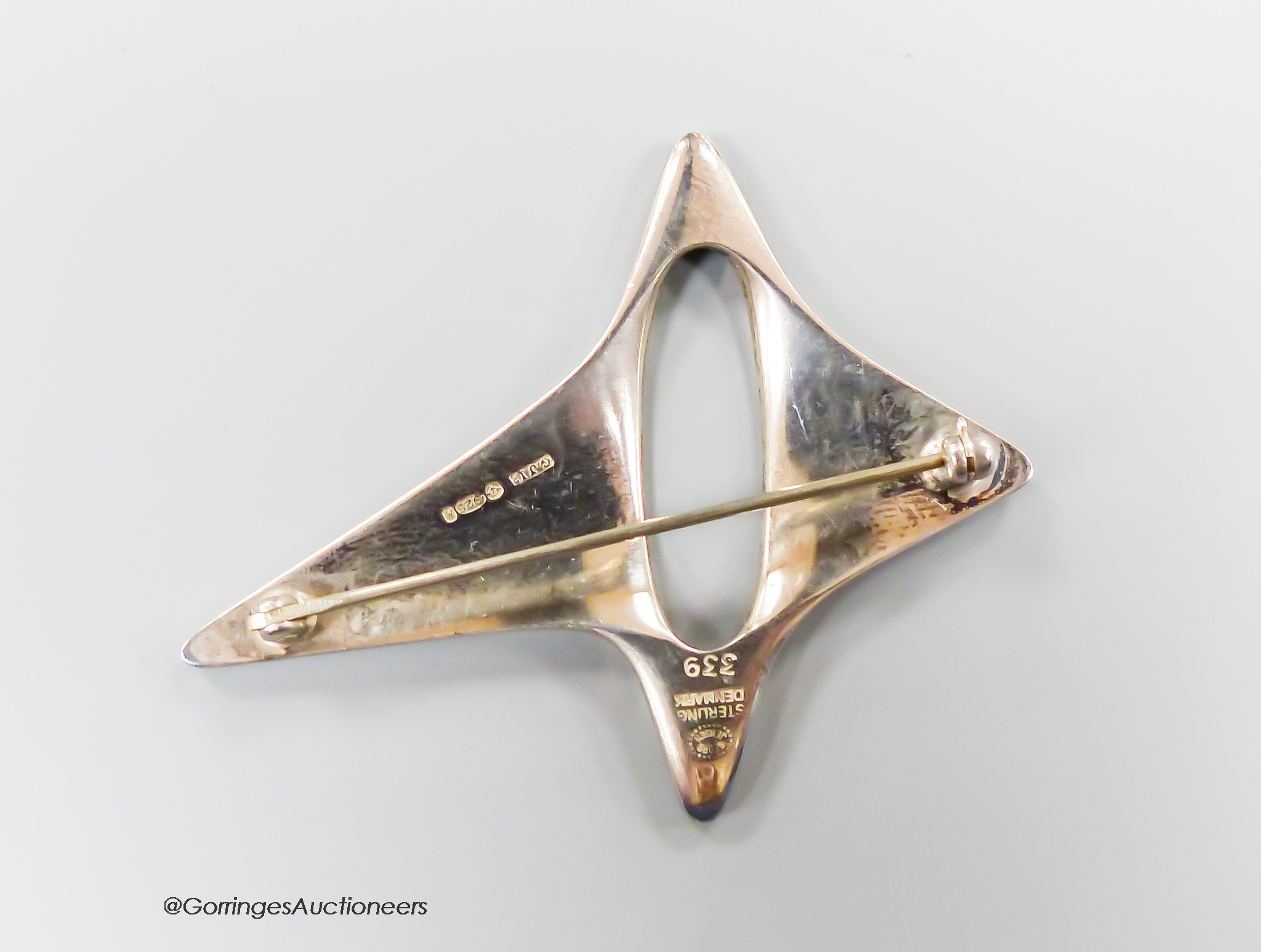 An early 1960's Georg Jensen sterling amorphic brooch, design no. 339, 59mm, 18 grams, with Jensen box.